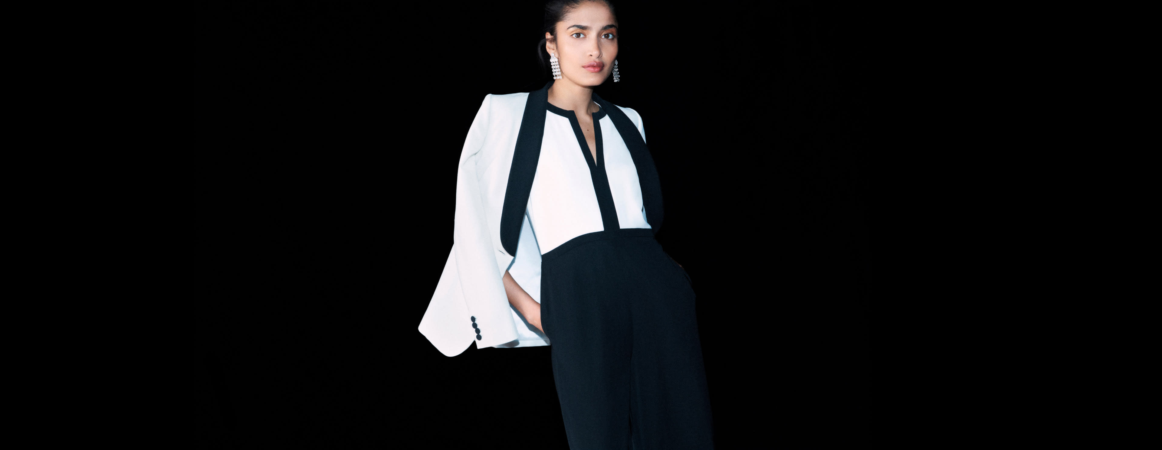 Model photographed in jumpsuit.